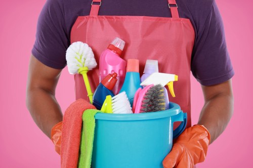 Housekeeping team handling linen and bathroom reset for a central London short let